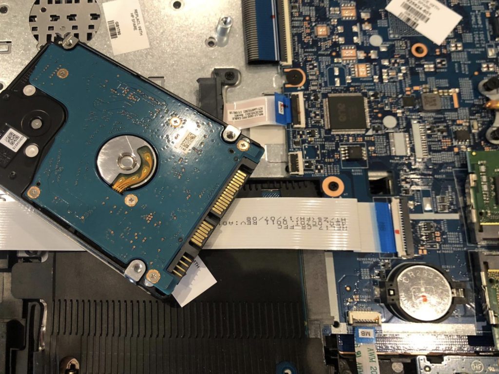 iPhone and external hard drive data recovery Toronto for liquid-damaged phones, logic board failures, broken drives, SD cards, and USB storage
