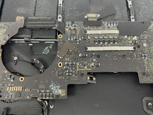 MacBook Water Damage: Repair the Logic Board or Save the Data First? MacBook water damage logic board repair inspection in Richmond Hill